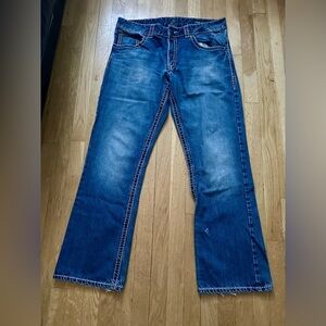 Blue Wrangler Relaxed Jeans with Natural Fading